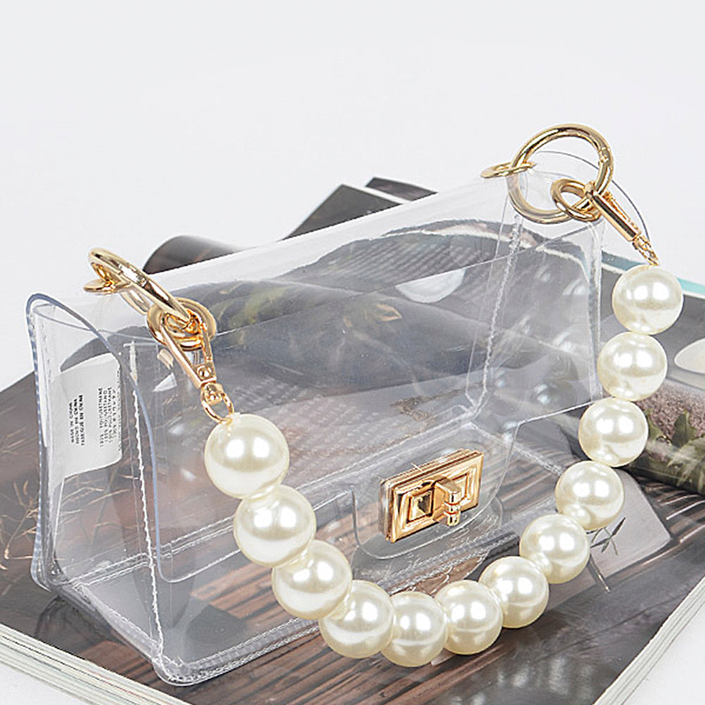 Clear Bag with Pearl Handle and Gold Chain Crossbody Strap: Features large pearl-like bead handle, gold chain strap. Available sizes: Small, Medium, Large.