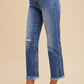 Comfort Stretch Straight Leg Frayed Hem Jeans in blue, featuring a small rip on one knee. Sizes available: 24-32.