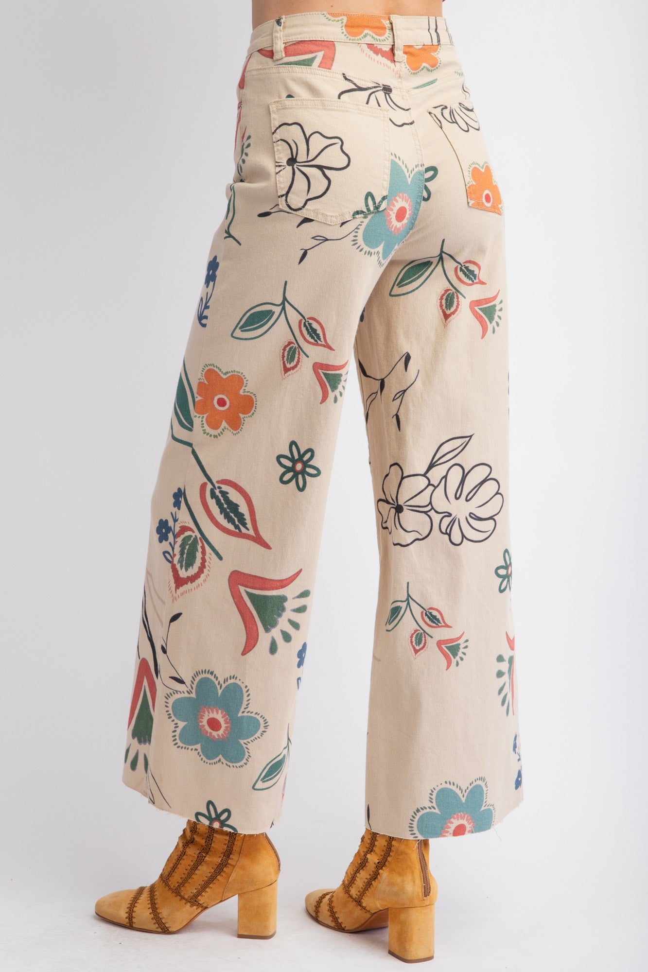 Printed Washed Twill Wide Pants with vibrant floral print in teal, orange, red, and black. Relaxed and loose fit. Available sizes: XS, S, M, L, XL.