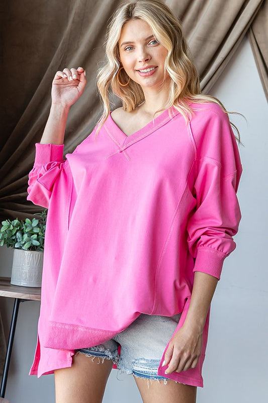 Hot Pink Raw Hem Loose Fit Top with rolled-up sleeves. Sizes available: S, M, L, XL.