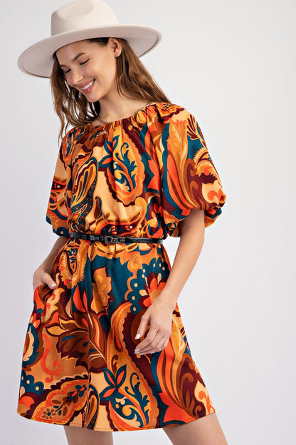 Sophia Printed Tie Back Dress. Abstract pattern in orange, teal, and red. Sizes: S, M, L, XL.