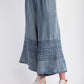 Mineral Washed Chambray Wide Leg Capri Pants feature a drawstring waist and subtle horizontal stitching near the hem. Sizes available: S, M, L, XL.