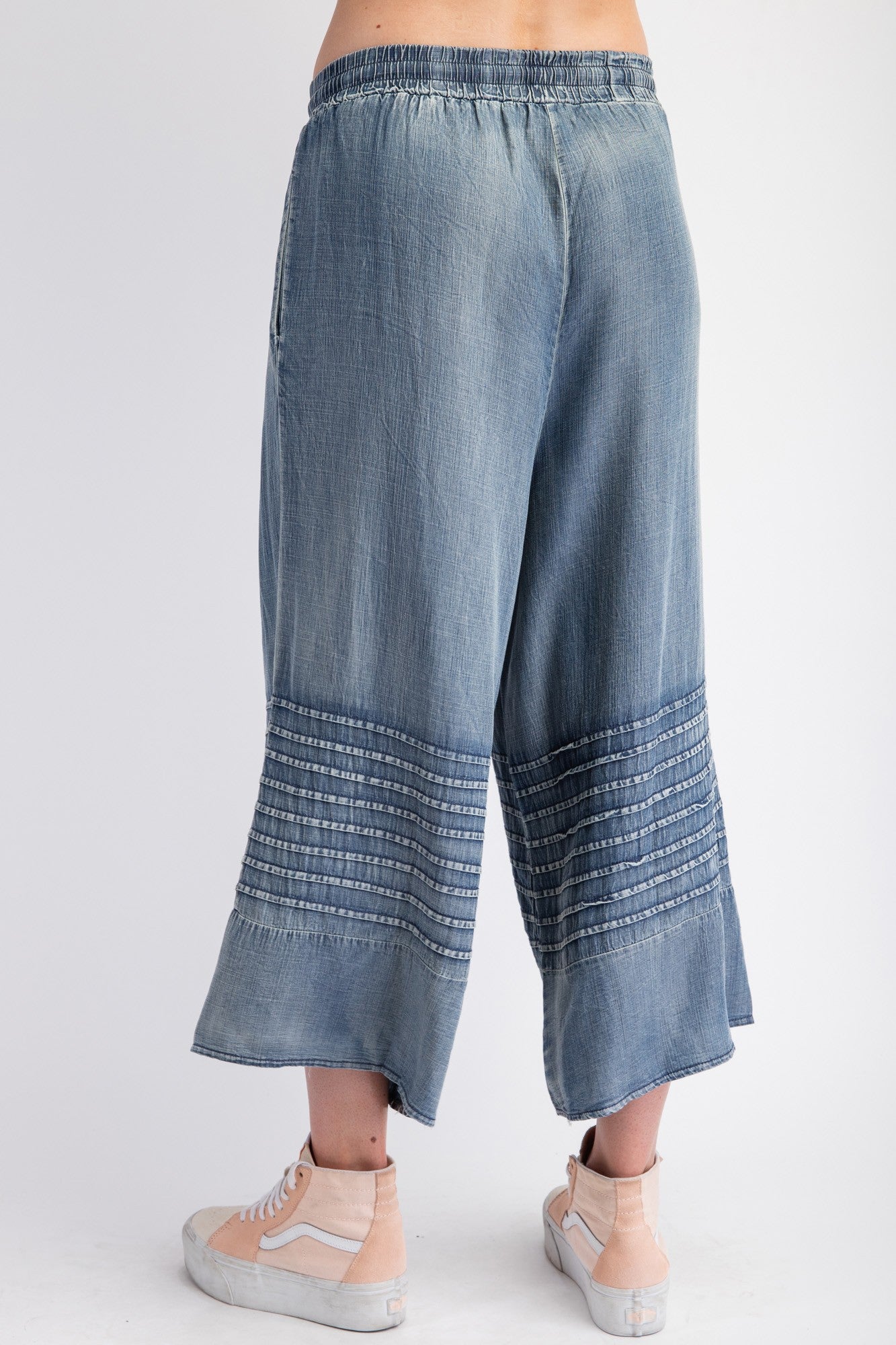 Mineral Washed Chambray Wide Leg Capri Pants with cuffed hems and decorative stitching near the bottom. Sizes: S, M, L, XL.