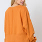 Gameday Crystal Stone Detail Sweatshirt in orange; available sizes: XS-XL.