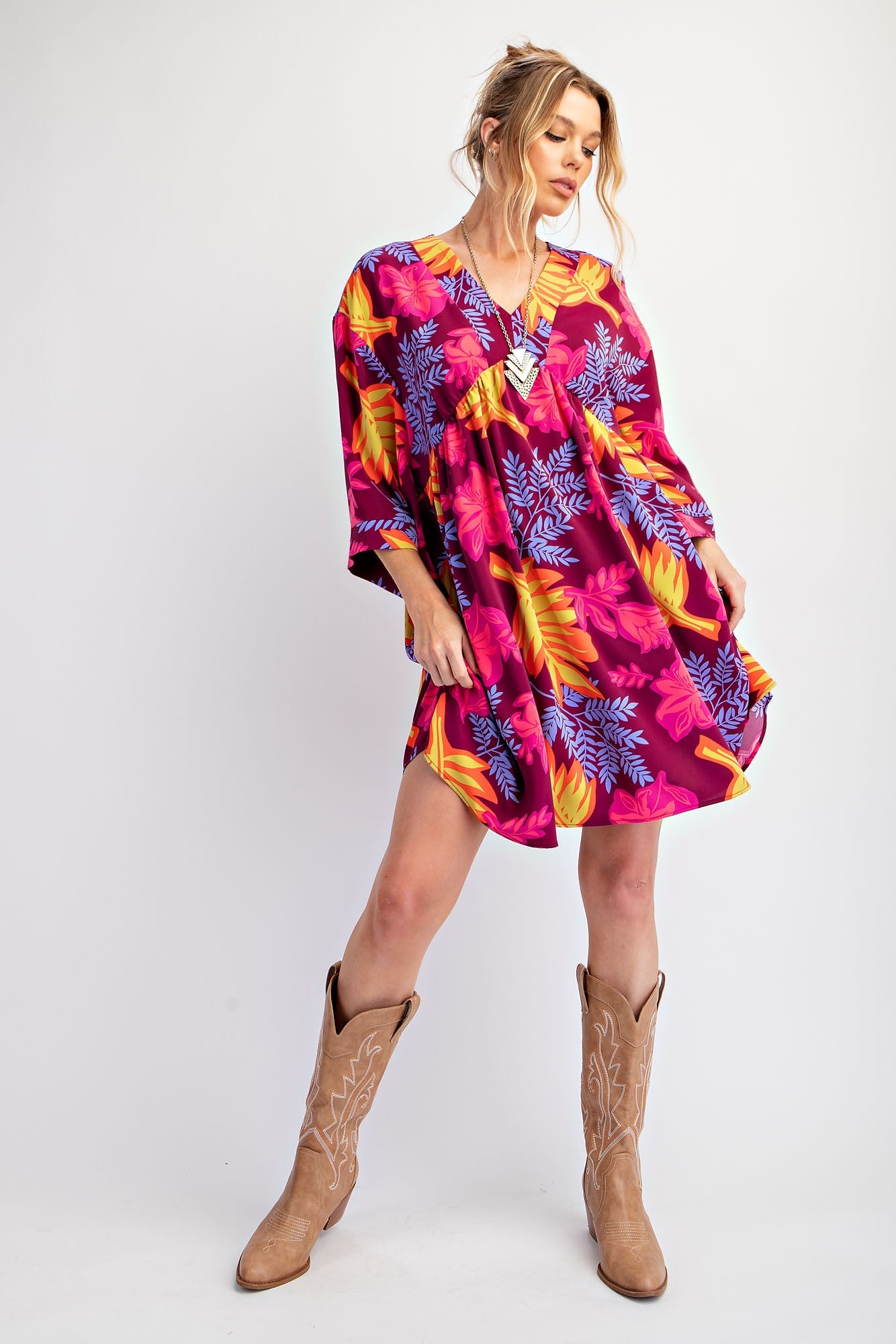 The Printed Sophia Twill Woven Dress features vibrant floral prints in red, pink, yellow, and purple tones. Available sizes: XS, S, M, L, XL.