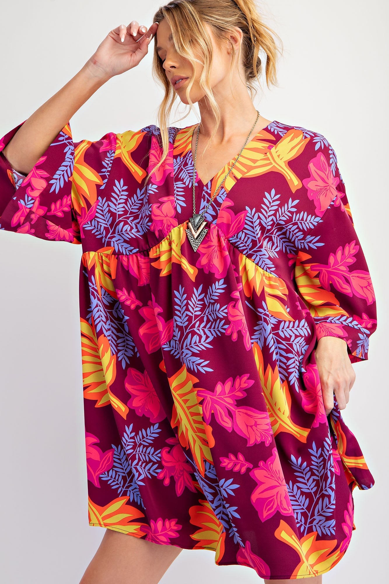 The Printed Sophia Twill Woven Dress: a vibrant floral fall dress in purple, pink, blue, and yellow. Available in sizes XS to XL.