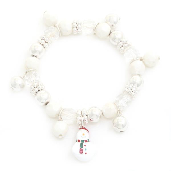 Product: Christmas Beaded Charm Bracelets  
Description: Features white beads, clear crystals, snowman charm with green and red accents. Perfect for holiday outfits.  
Sizes Available: One size fits most.