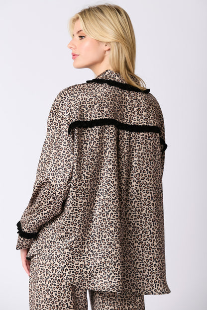 Satin Leopard Print Set with black ruffle trim on shoulders and back, elastic waistband. Available in sizes S, M, L.