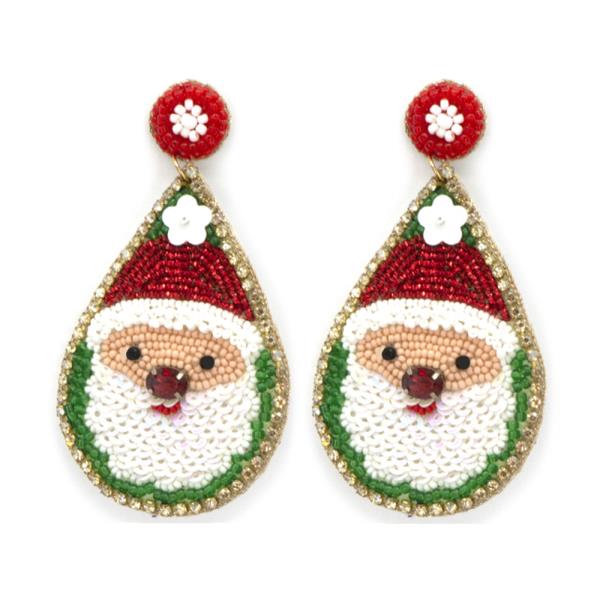 The Joy of Christmas Festive Earrings feature teardrop designs with beaded Santa faces, red hats, white beards, gold trim, and red studs. Sizes: One size fits all.