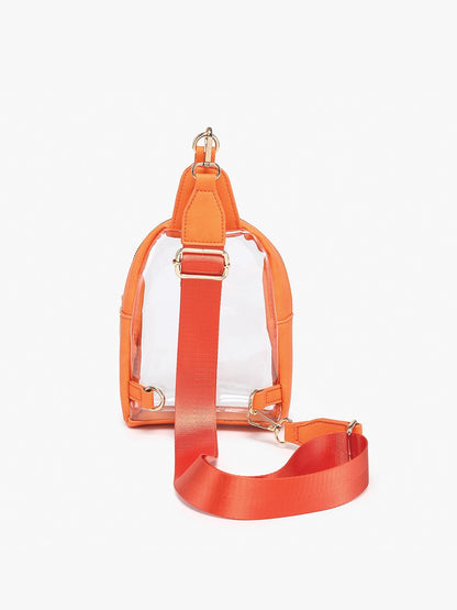 Clear sling bag with orange trim, gold hardware, wide red adjustable strap. Sizes: Small, Medium, Large.