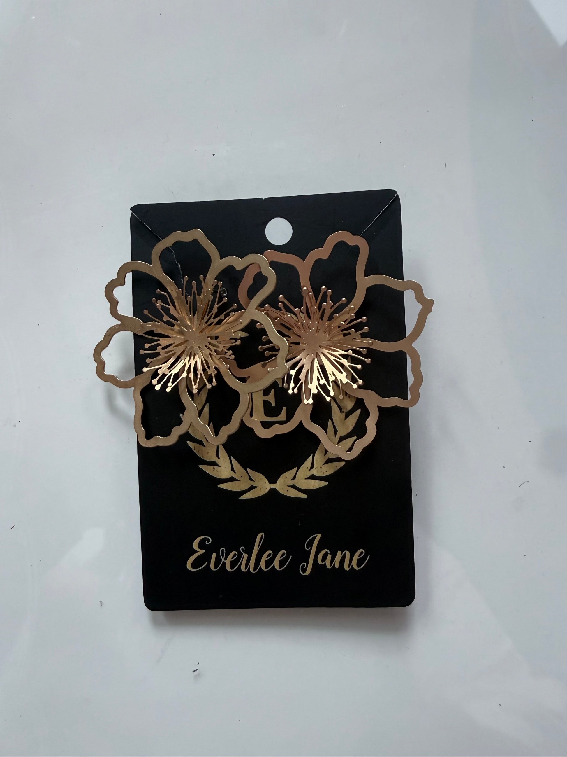 Charlotte Gold Flower Earrings with petal and stamen details. Available in S, M, L.