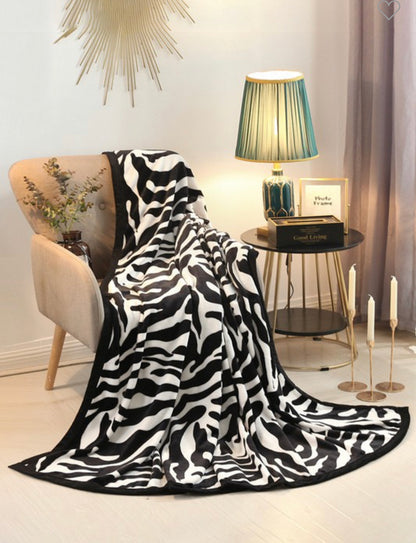 Zebra Print Super Soft Blanket, chic style, available in Twin, Queen, and King sizes.