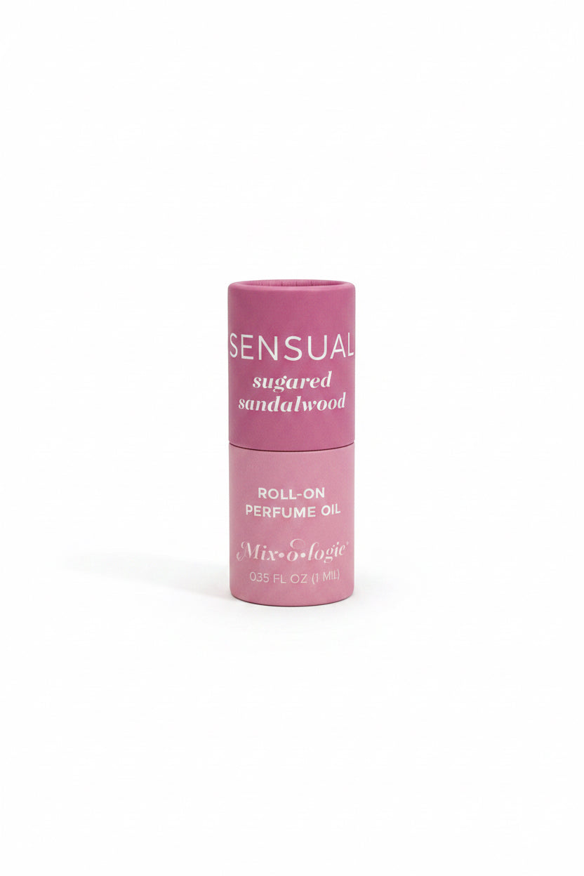 Pink Keychain Mini Rollerball Perfume, "SENSUAL sugared sandalwood," available in mini size.