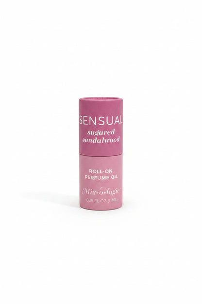 Pink Keychain Mini Rollerball Perfume, "SENSUAL sugared sandalwood," available in mini size.