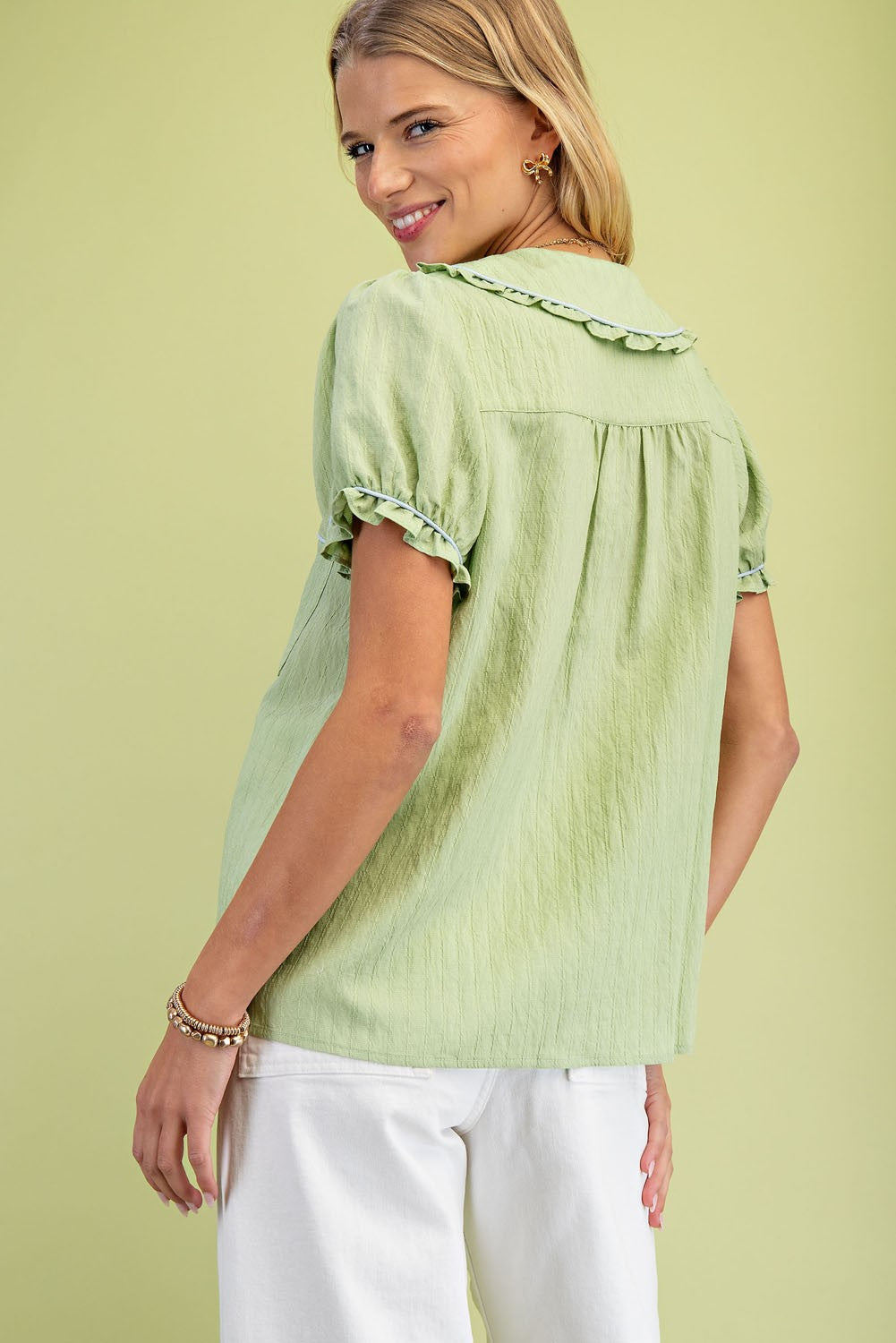 Light green Ruffle Trimmed Peter Pan Collar Blouse with puff sleeves. Sizes available: XS, S, M, L, XL.