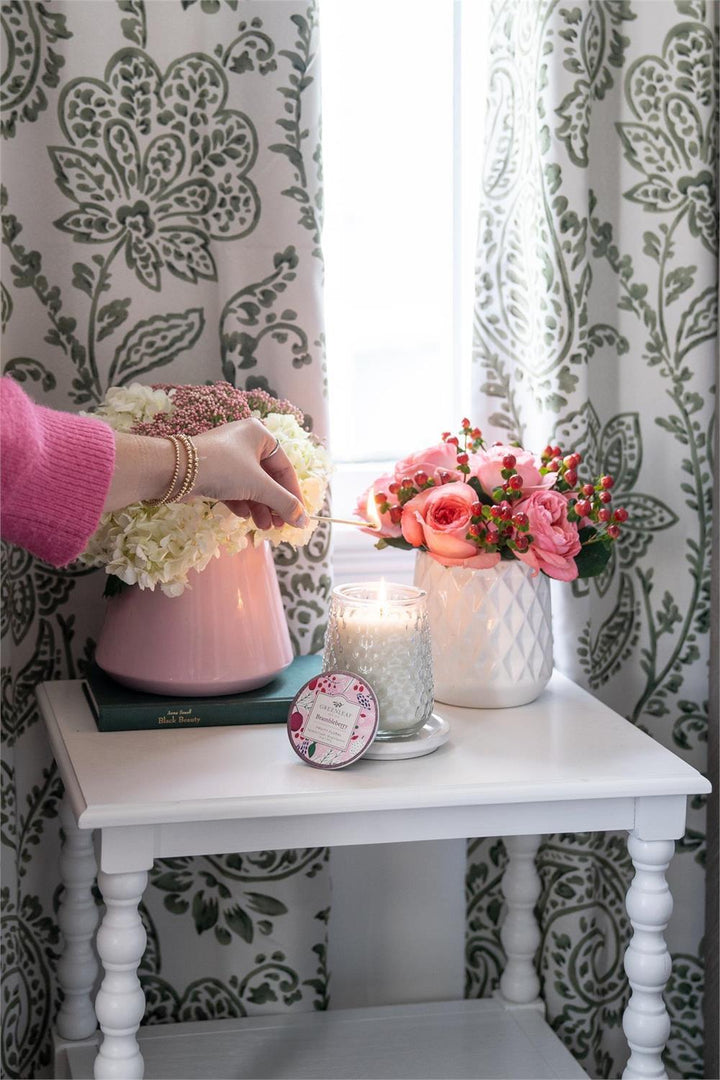 Brambleberry Signature Candle in textured glass with a berry-illustrated label.