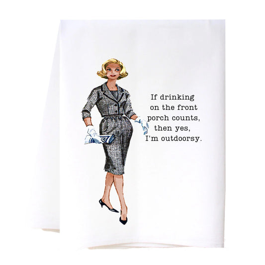 The Flour Sack Cora & Pate Tea Towels feature a retro-style illustration of a woman in vintage attire, holding a purse and wearing white gloves. Durable high thread count; vibrant ink jet text: "If drinking on the front porch counts, then yes, I'm outdoorsy." Sizes available: 28" x 29".