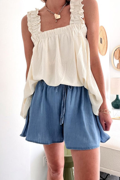 Denim Drawstring Wide Leg Shorts offer a casual, relaxed fit, perfect for summer. Available sizes: XS, S, M, L, XL.