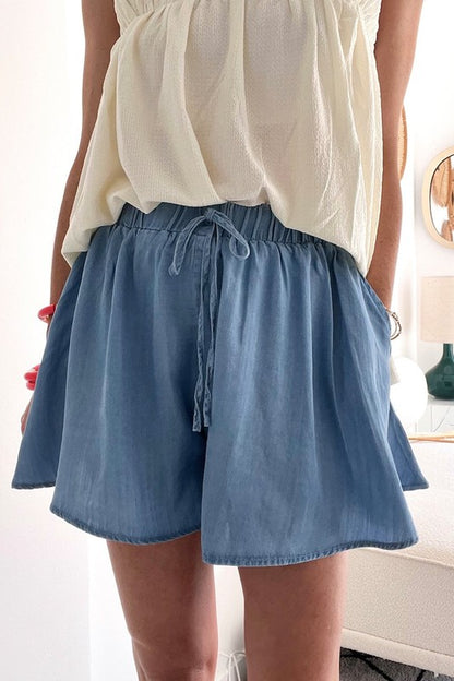 Denim Drawstring Wide Leg Shorts: Relaxed fit with adjustable drawstring waist. Sizes available: XS, S, M, L, XL.