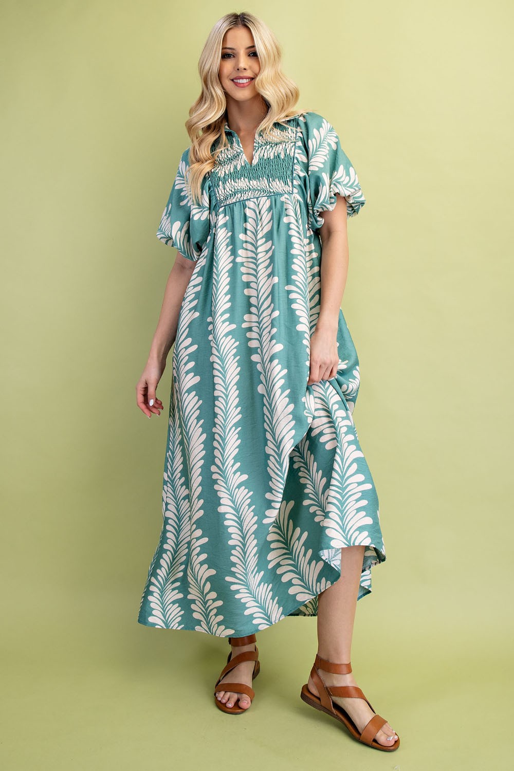 Printed Short Puff Sleeve Midi Dress in teal and white print. Available in sizes XS-XL.