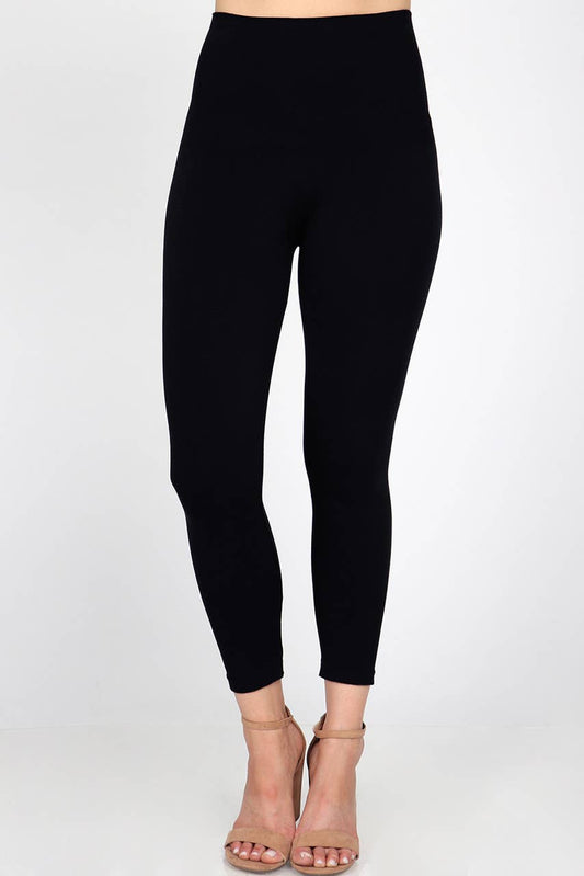 The Cropped Tummy Tuck Legging (Plus Size), black, available in plus sizes; cropped length with a high-rise fit.