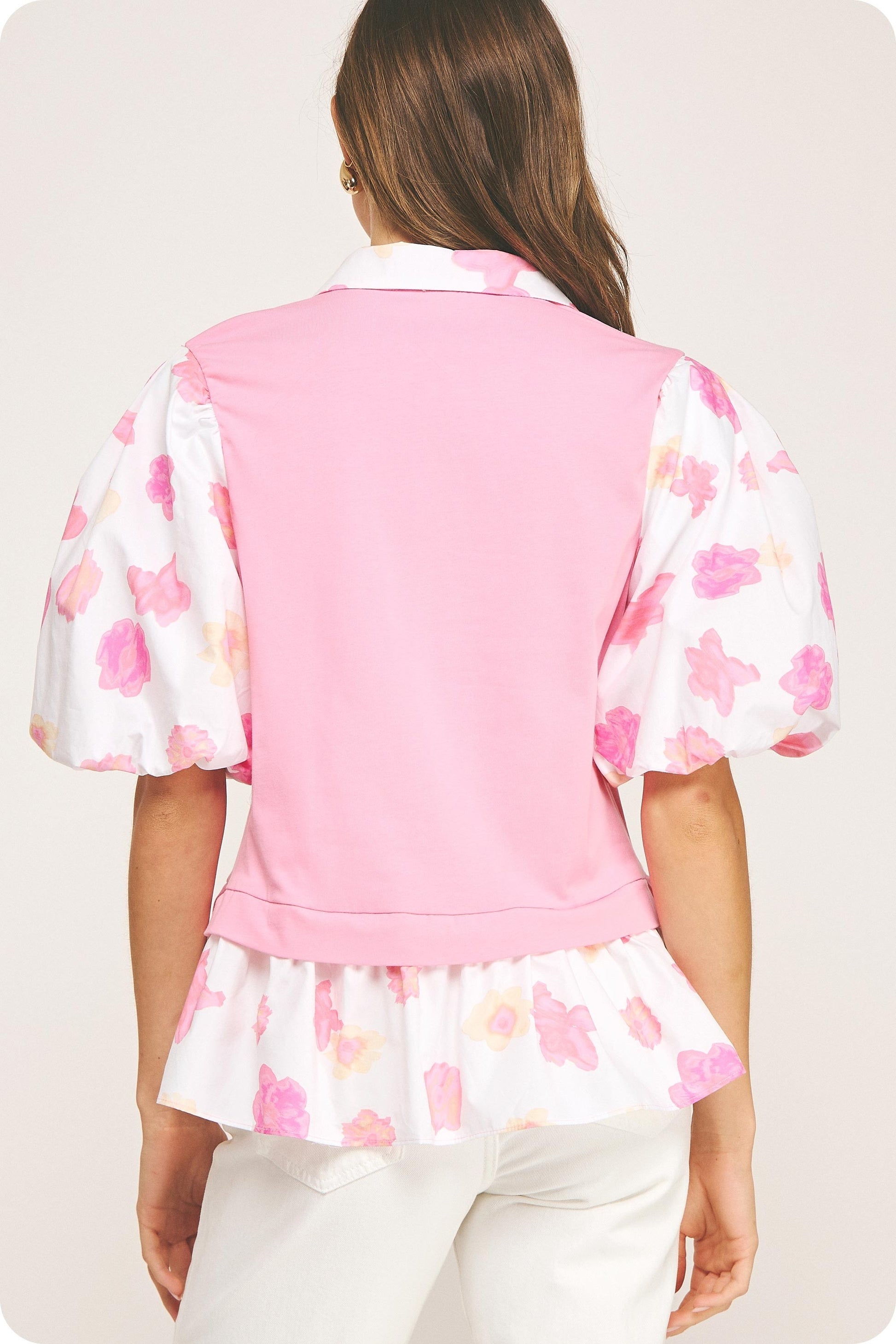 Floral Print Sleeve Knit Top with puffed sleeves and ruffled hem. Available in sizes XS–XL.