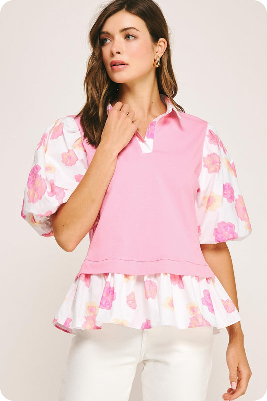 Floral Print Sleeve Knit Top with puffed floral sleeves and ruffled hem. Available in sizes XS–XL.