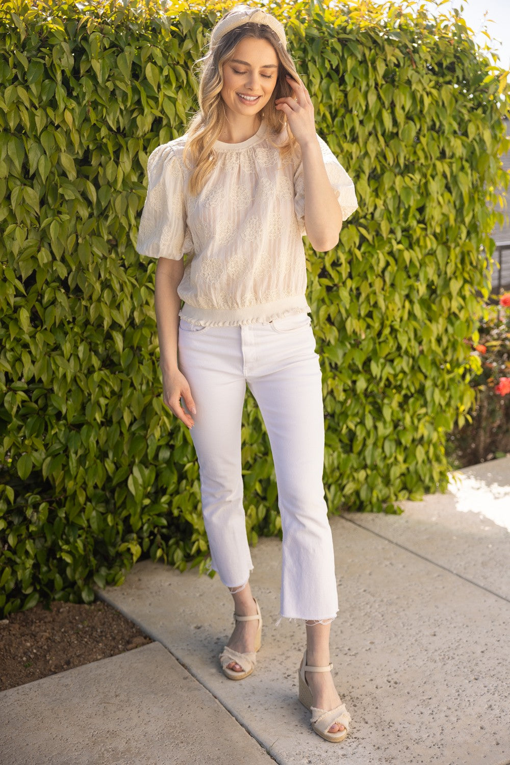 Tilly Elastic Knit Hem Embroidered Top, featuring elastic hem and embroidery. Available in sizes XS-XL.