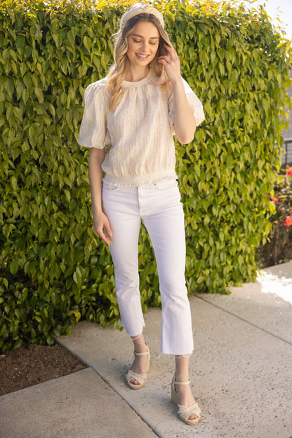 Tilly Elastic Knit Hem Embroidered Top, featuring elastic hem and embroidery. Available in sizes XS-XL.