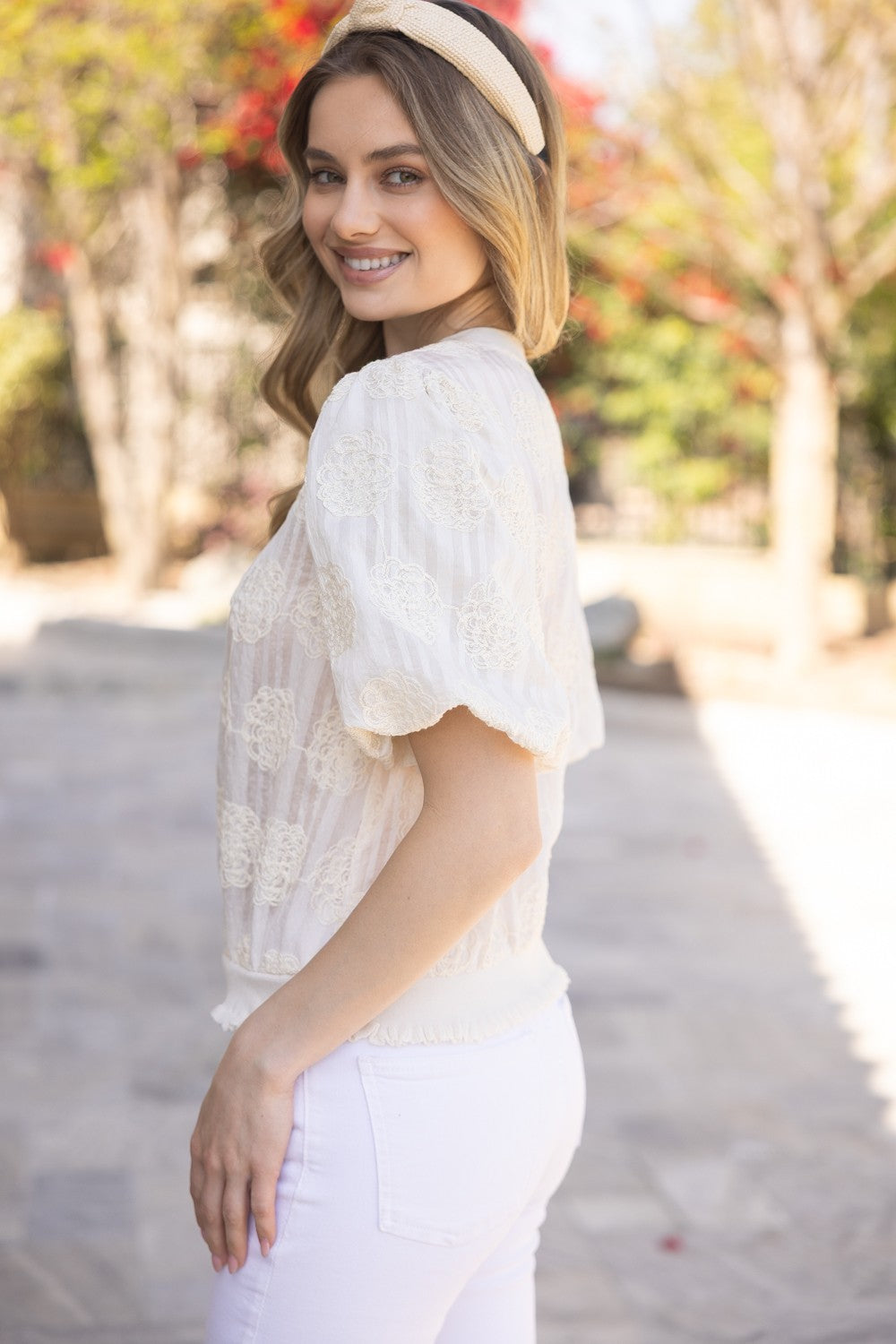 Tilly Elastic Knit Hem Embroidered Top with delicate detailing; available in sizes XS–XL.