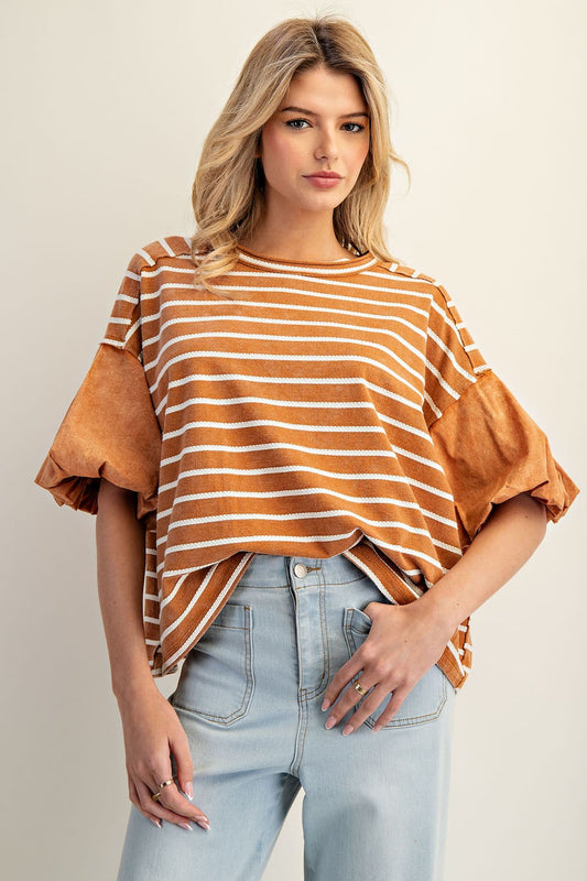Cinnamon Striped Puff Sleeve Top with orange and white stripes, ruffled sleeves. Available in XS–XL.