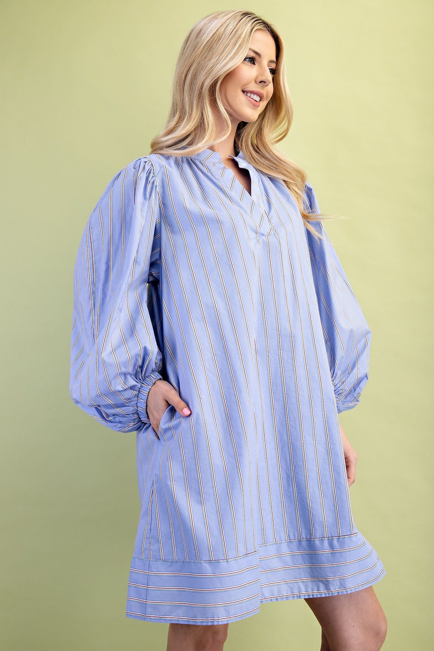 Leah Mixed Stripe Print Mini Dress features blue and white stripes, balloon sleeves, and a v-neckline. Available in sizes XS–XL.