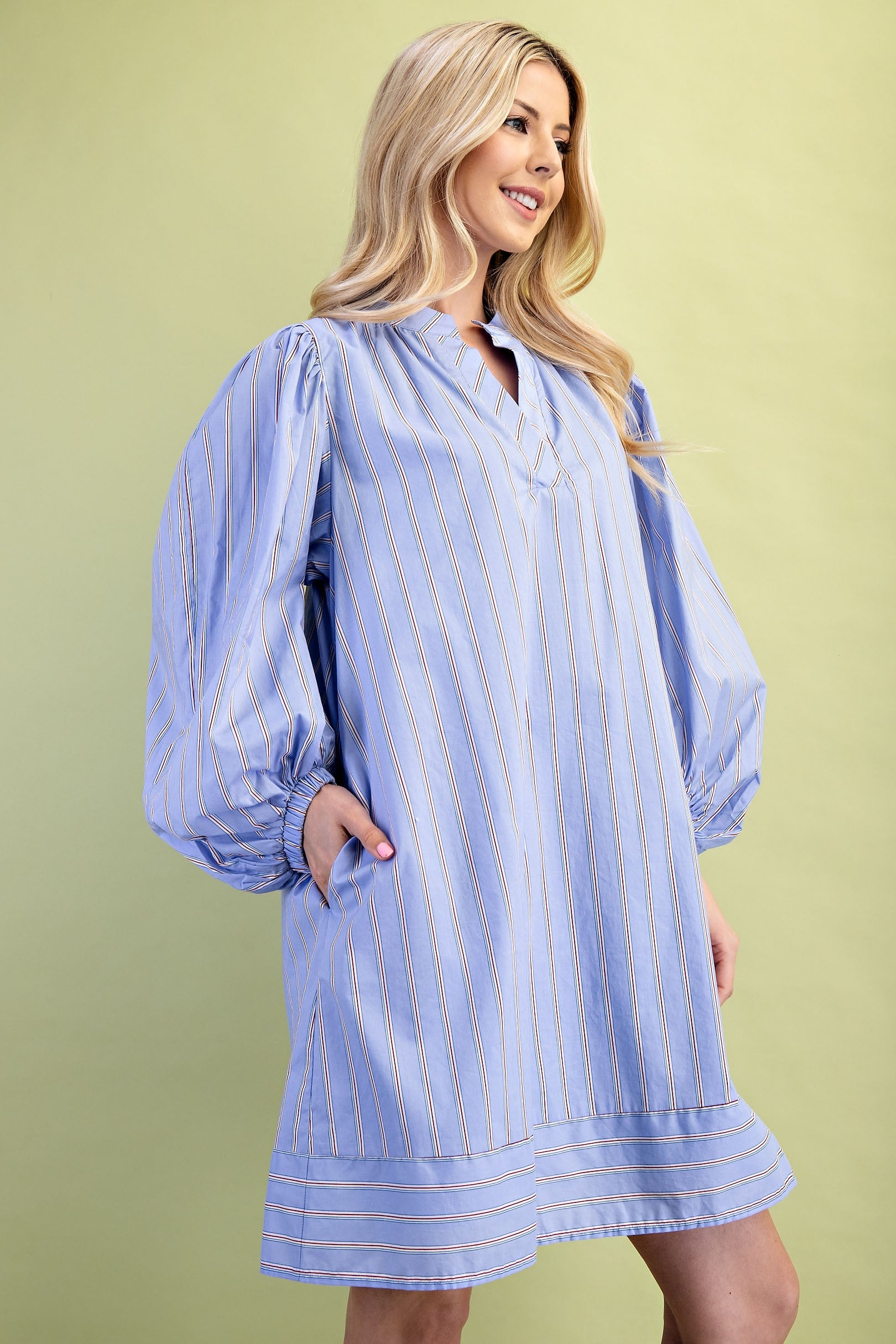Leah Mixed Stripe Print Mini Dress features blue and white stripes, balloon sleeves, and a v-neckline. Available in sizes XS–XL.