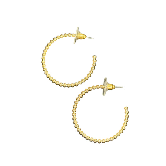 The Ruth Beaded Hoop Earrings feature gold beads and clear backings; available in small, medium, and large sizes.