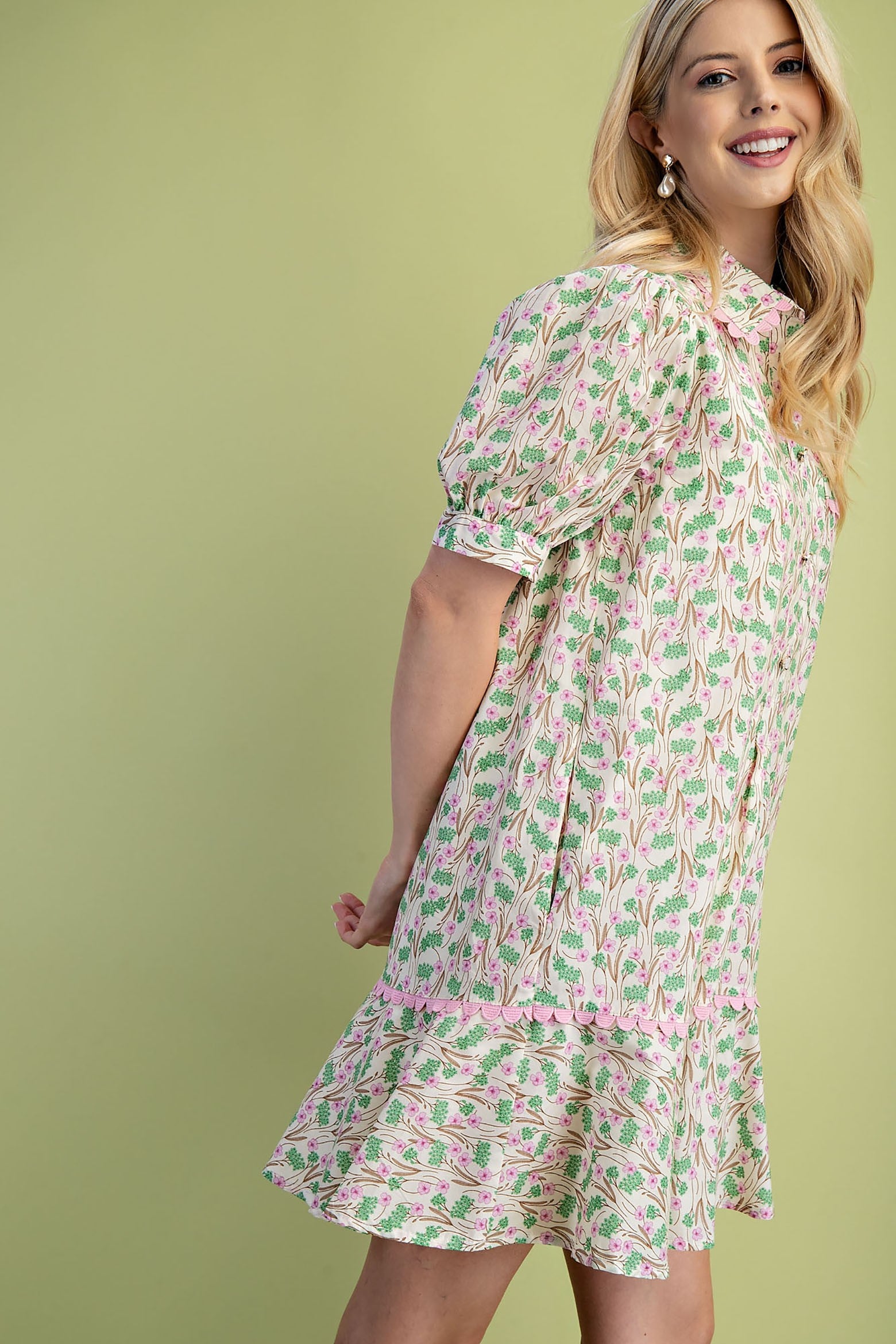 Mia Floral Print Mini Dress; lightweight fabric; ruffled hem. Available in sizes XS, S, M, L, XL.