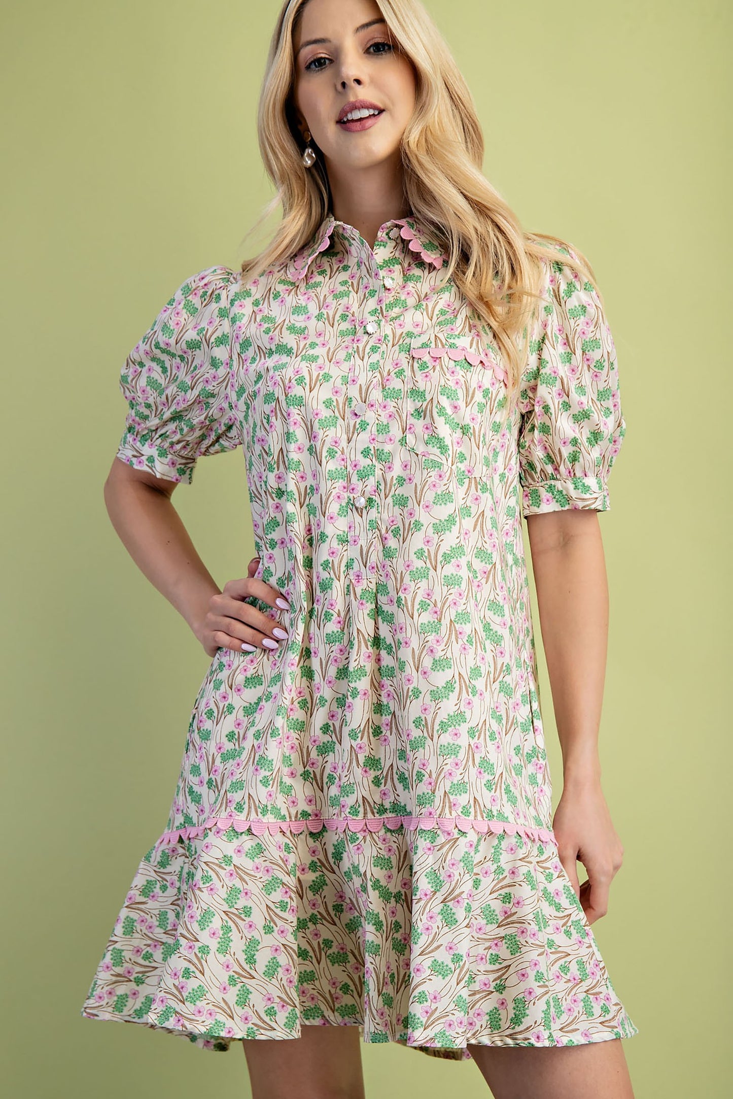 Mia Floral Print Mini Dress features lightweight fabric, puff sleeves, and a tiered ruffle hem. Available in sizes XS–XL.