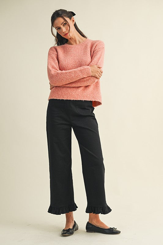 Black Ruffle Hem Cropped Pants in stretch cotton twill, available in sizes XS-XL.