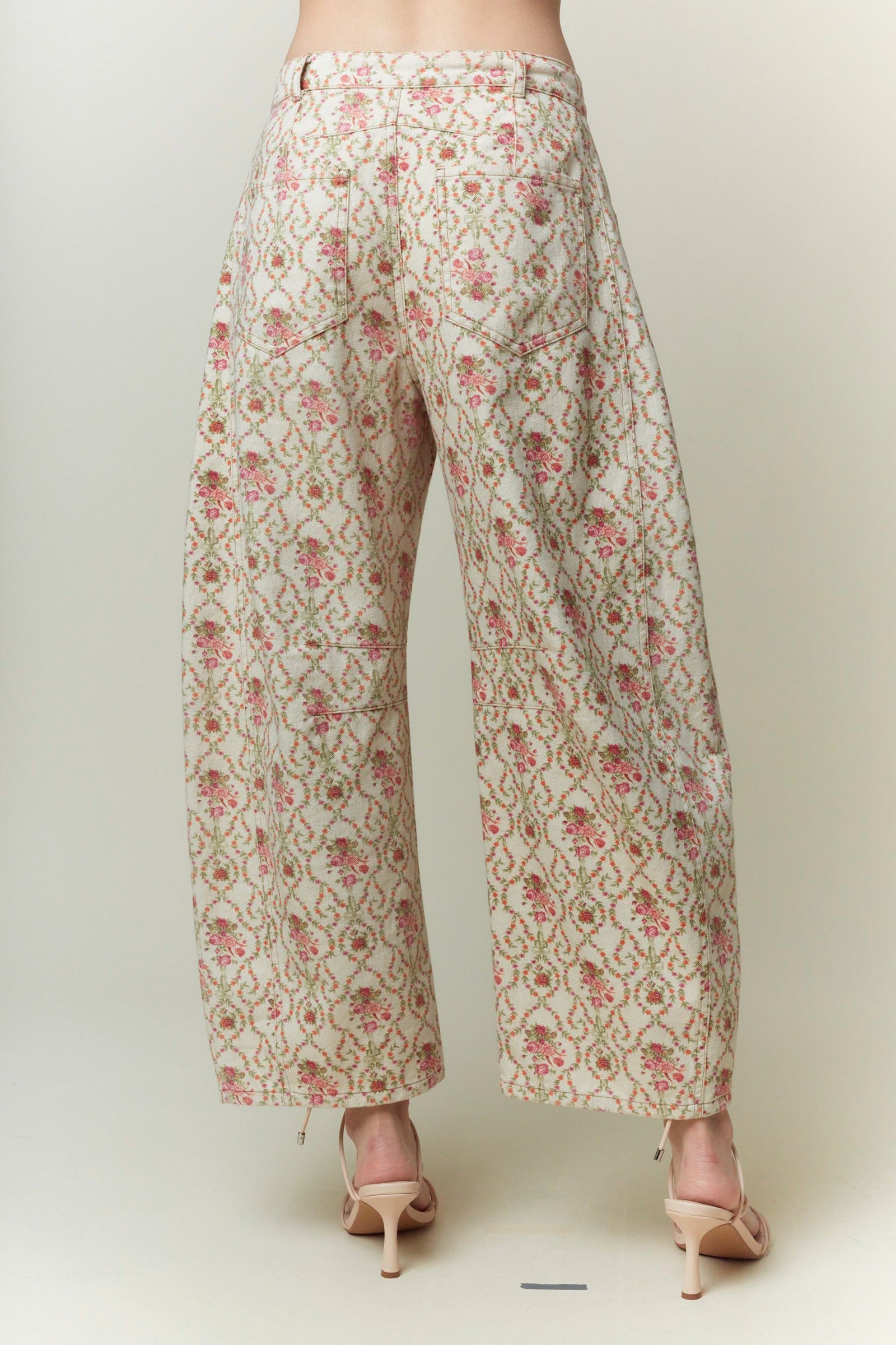 High-waisted, wide-leg Jacquard Floral Printed Barrel Jeans in cream with pink and green florals. Sizes: XS-XL.