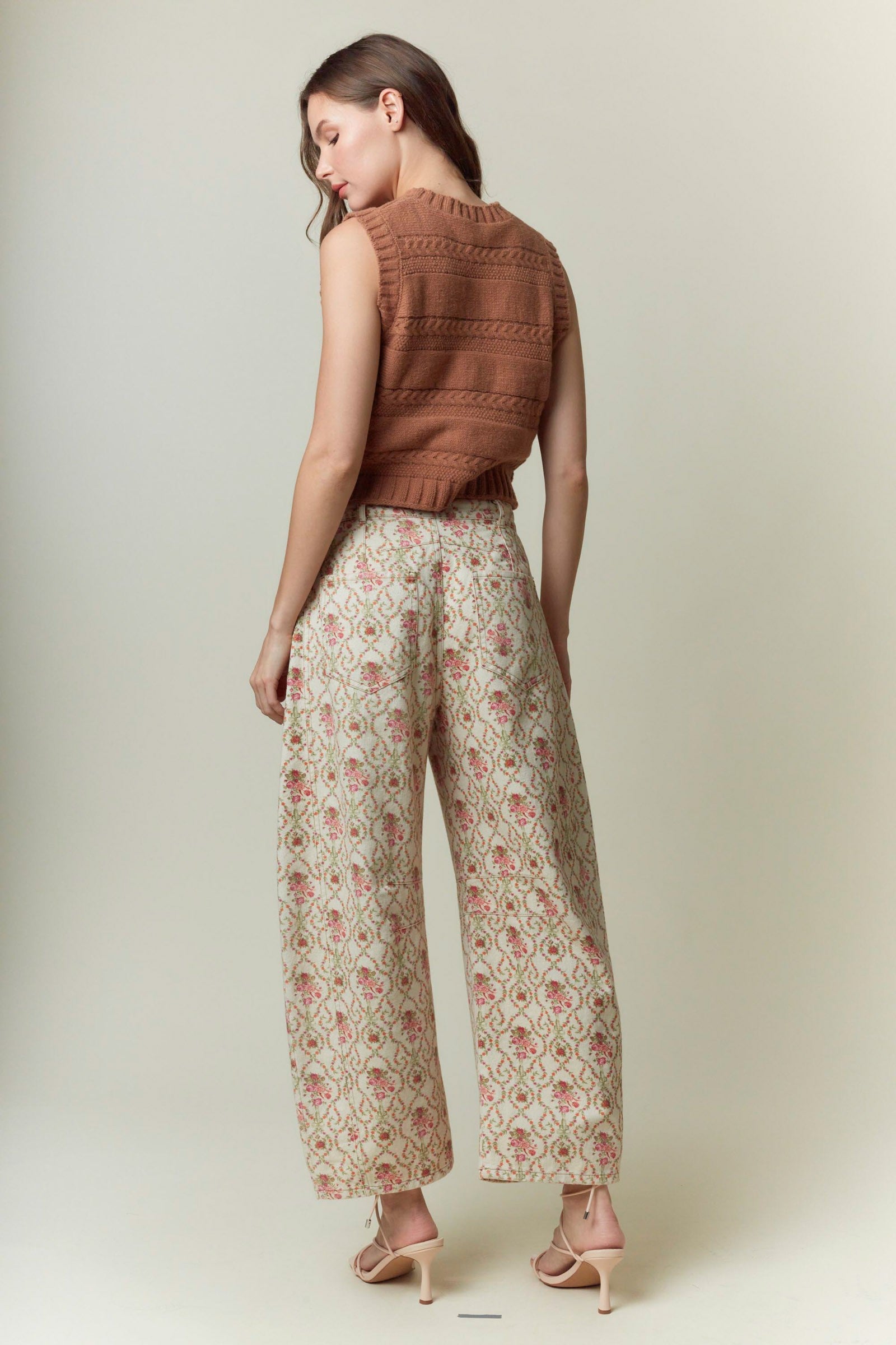 High-waisted Jacquard Floral Printed Barrel Jeans with pink and green floral pattern. Available in sizes XS-XL.