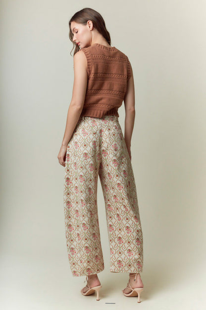 High-waisted Jacquard Floral Printed Barrel Jeans with pink and green floral pattern. Available in sizes XS-XL.
