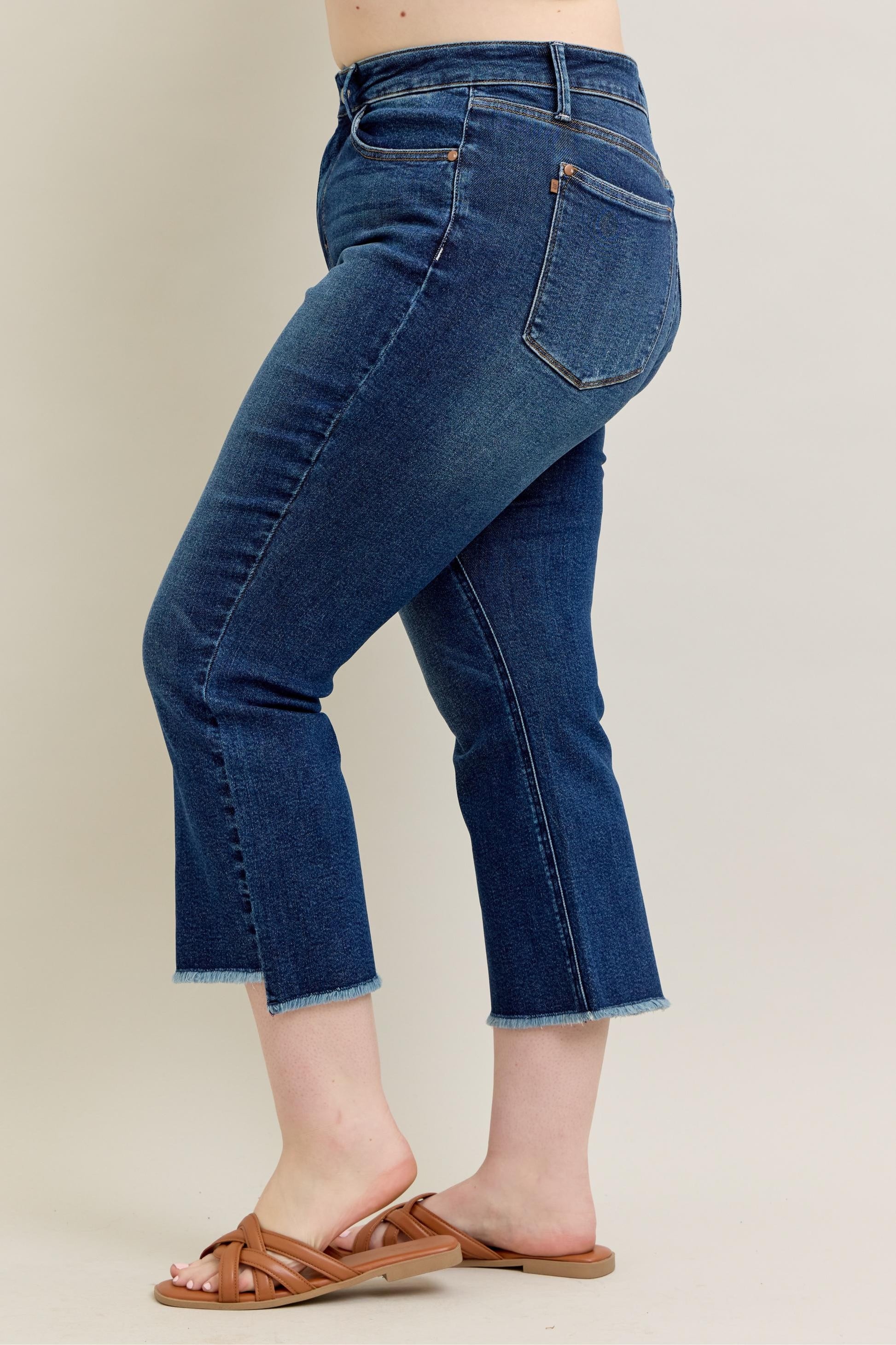 Judy Blue HW Dark Wash Kick Flare Jeans with raw hems. Sizes available: 0–20W.
