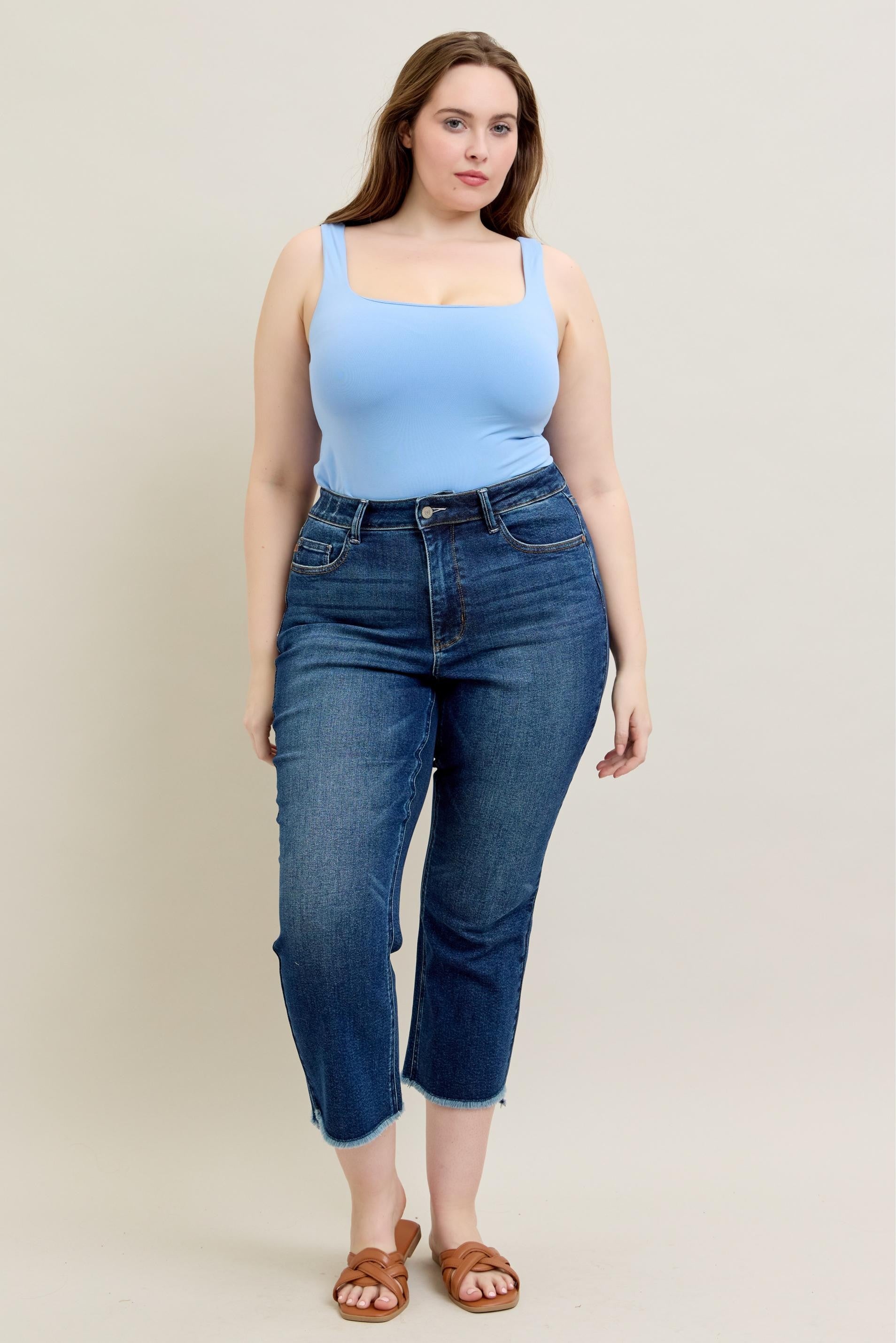 Judy Blue HW Dark Wash Kick Flare Jeans feature a high waist and kick flare design in dark wash denim. Available in sizes 0-24.