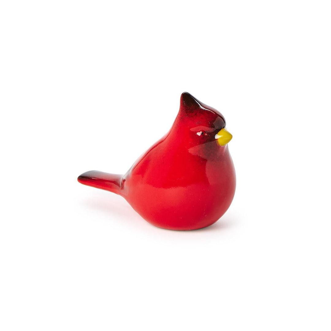 Hand-painted cardinal sculpture with red body, black face mask, and yellow beak.
