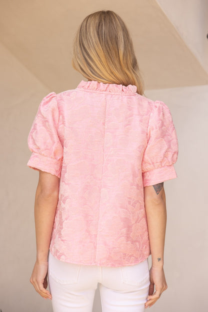 Poppy Ruffled V-Neck Floral Top: light pink, textured, puffed sleeves, ruffled collar. Available in sizes XS-XL.