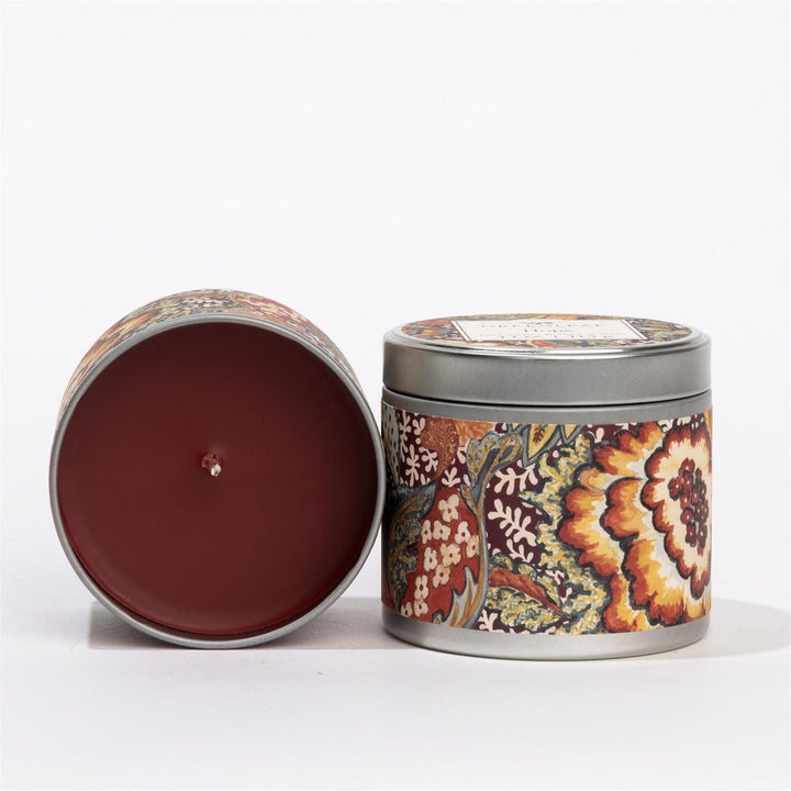 Two Hope Tin Candles with floral patterns, red wax, and unlit wick. Available in 4oz and 8oz sizes.