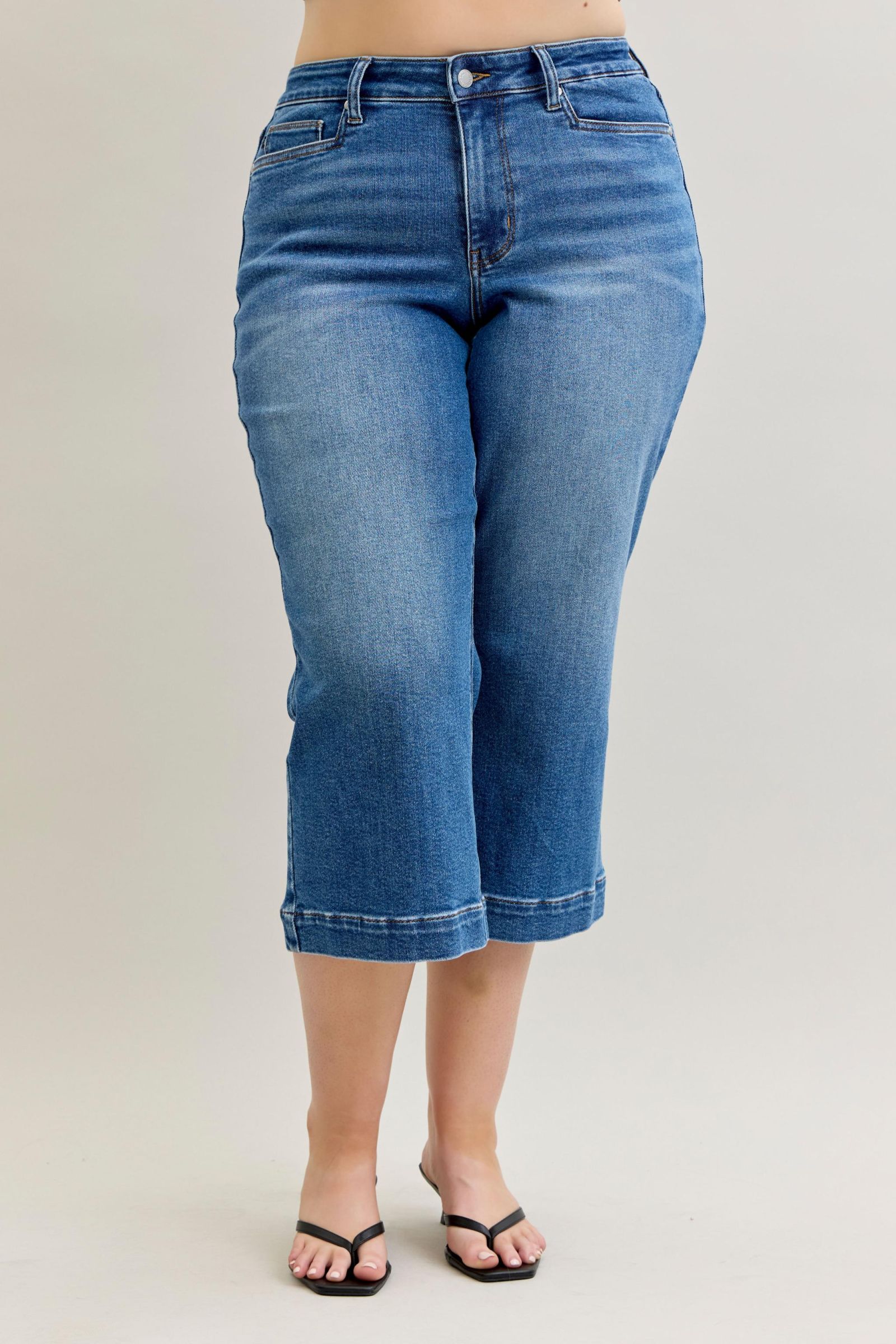 Judy Blue Capri Jeans, available in sizes 0-24, with classic mid-wash and cropped length.