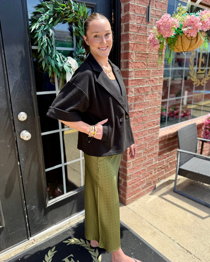 Polka Dot Satin Skirt in green, wide-leg style, available in sizes XS–XL.
