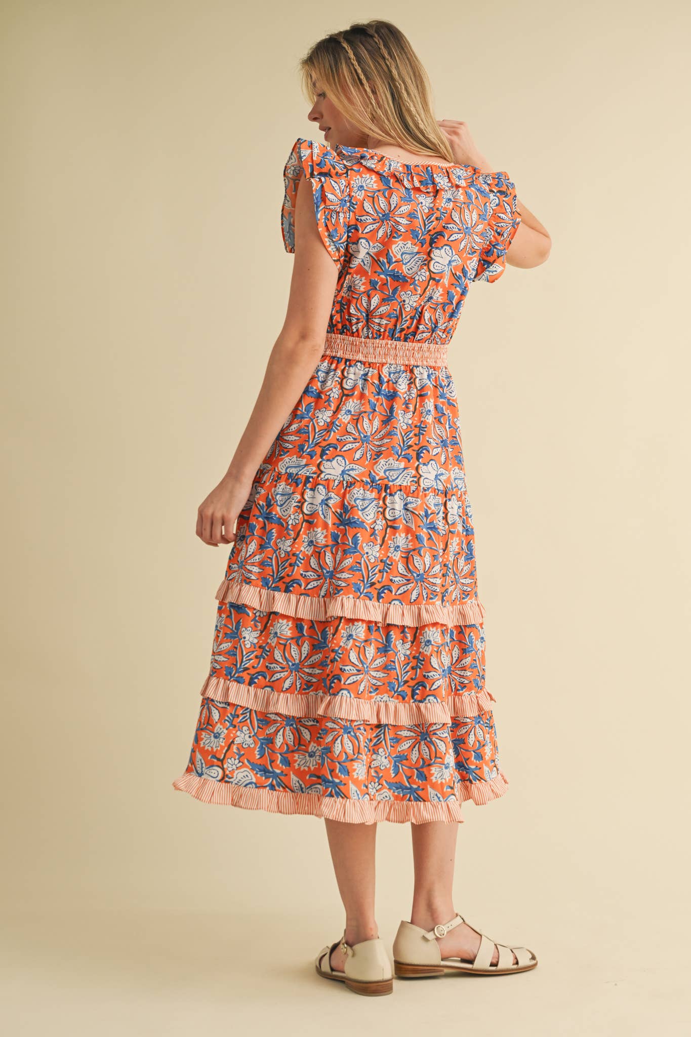 Mixed Floral Print Ruffle Trim Midi Dress with smocked waistband. Available in sizes XS-XL.