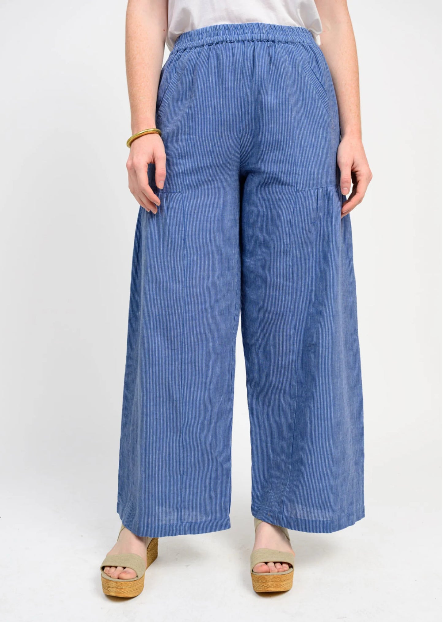 Blue Wide Leg Stripe Pant with elastic waistband and pinstripes. Available in sizes XS–XL.