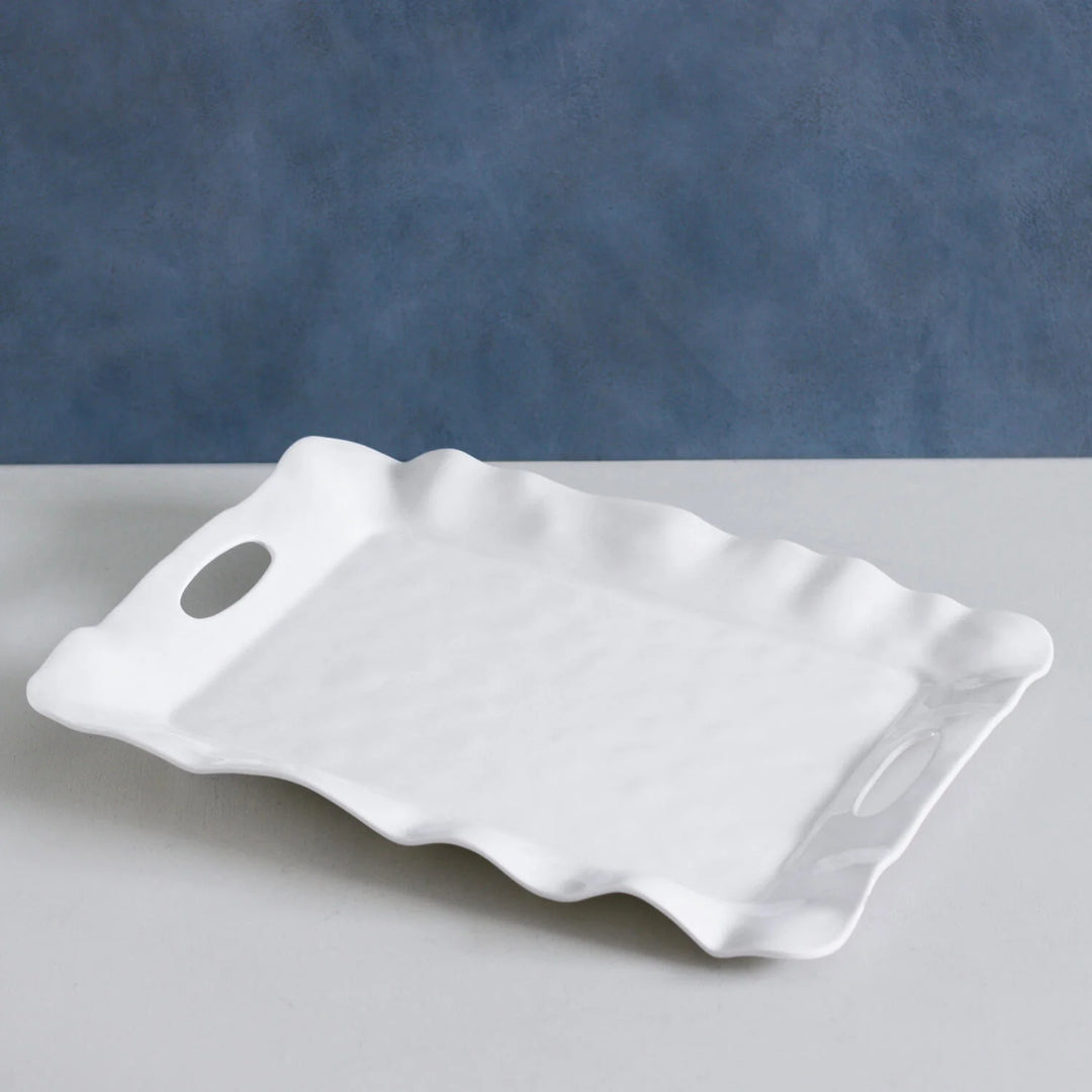 The VIDA Havana Rectangular Tray (White) has wavy edges, oval cut-out handles; available in small, medium, and large sizes.